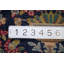 Tapis bleu carré à motif floral 2 x 2