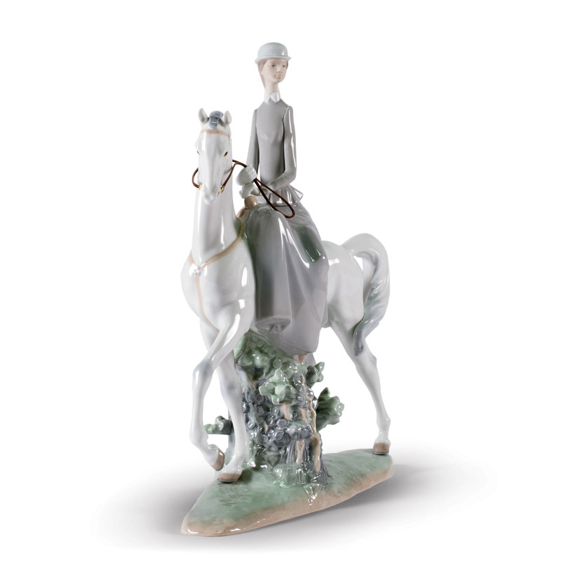 Woman on Horse Figurine