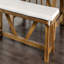 Banc rembourré de style moderne avec assise rembourrée, base en tréteaux de style rustique