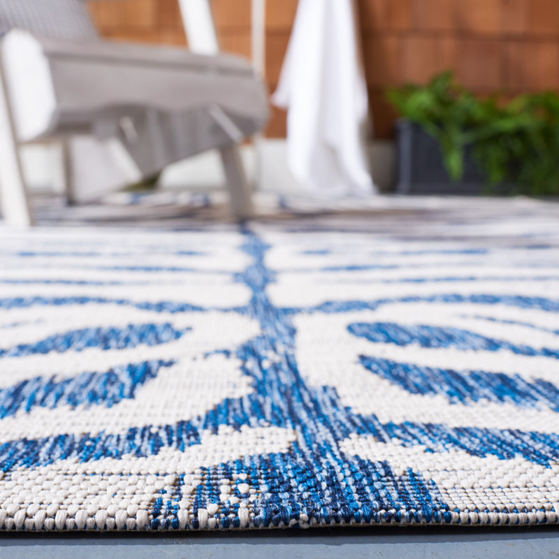 Ivory and Navy Animal Print Indoor/Outdoor Rug