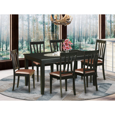 Sisneros 6 - Person Rubberwood Solid Wood Dining Set