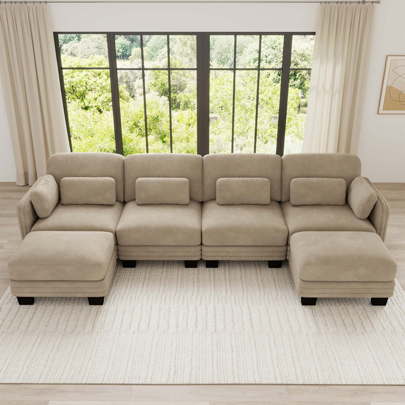 Canapé d'angle modulaire capitonné avec poufs amovibles