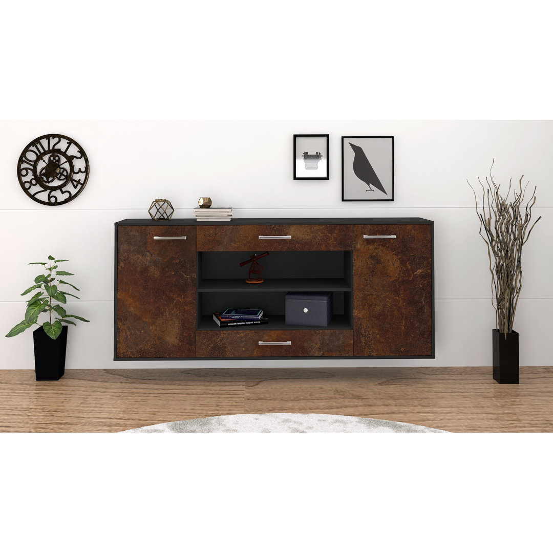 Das Sideboard Mussab hat Metallgriffe. Es hat die Maße 180 cm x 79 cm x 35 cm.