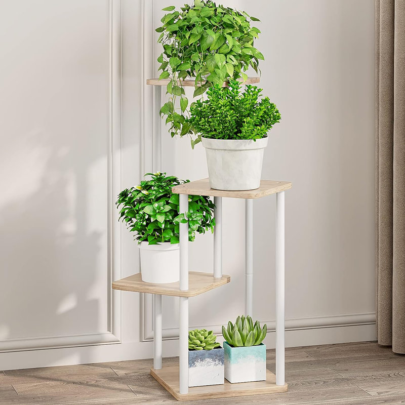 Support à fleurs à 4 niveaux en métal, un support robuste et élégant pour plusieurs plantes à l'intérieur et à l'extérieur