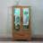 Lighted Glass Curio Display Cabinet With Adjustable Shelves - 2 Doors, 1 Drawer, LED Lights, Elegant Light Oak Finish