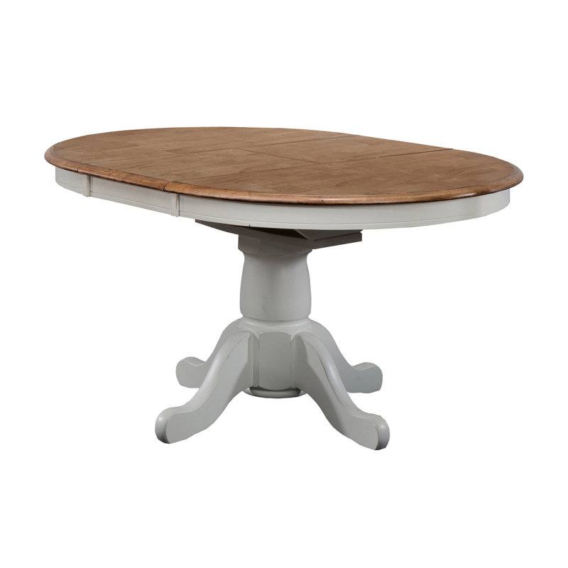 Kinsler Extendable Round Solid Wood Dining Table