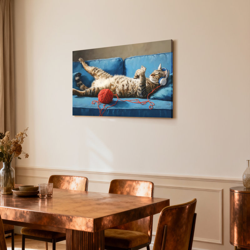 Ensemble de 1 tableau sur toile tendue représentant un chat avec un casque d'écoute et de la laine, H 12 po x l 18 po