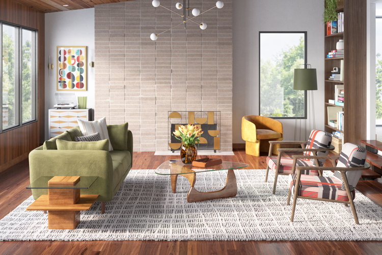 retro-style living room with a large brick chimney, geometric area rug, green sofa, and abstract coffee table