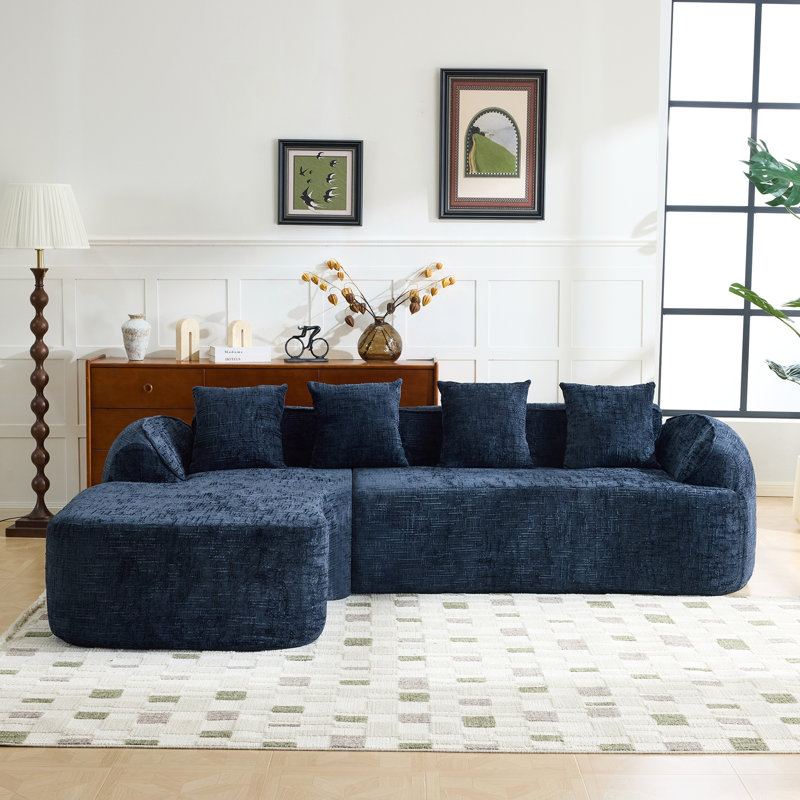 Canapé en forme de L en chenille bleu foncé avec éponge hautement élastique, accoudoirs courbés et quatre coussins décoratifs pour plus de confort et de style