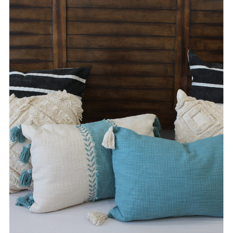Housse de coussin lombaire bleue à pampilles