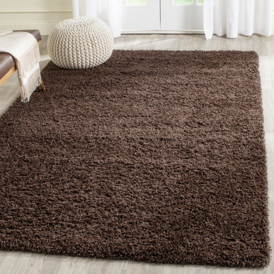 Tapis à poil long performance de couleur unie Rizco
