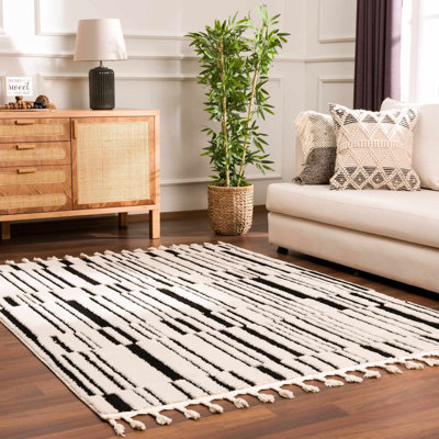 Jdan Striped Machine Woven Polypropylene Area Rug in Black