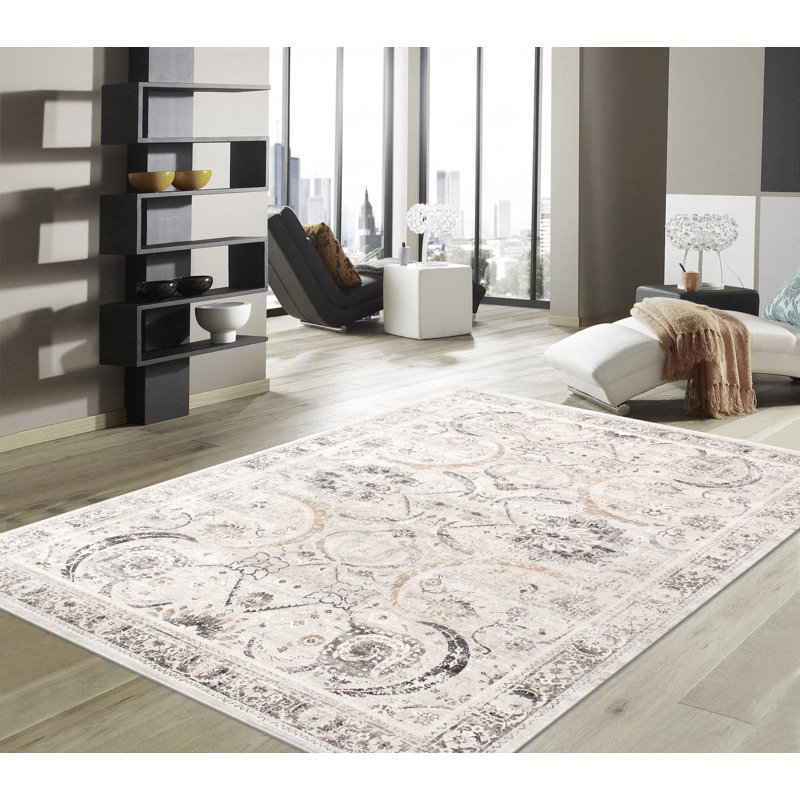 Handmade Ivory Rectangular Stain-Resistant Synthetic Rug 5' x 7'