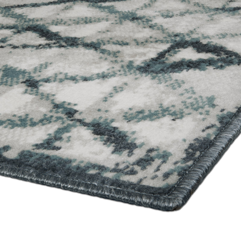 Tapis bleu tissé à la machine Kaylin