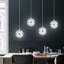 Luminaire suspendu à 4 lumières Adetoun Orb