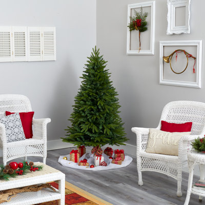 Sapin de Noël vert artificiel avec lumières blanches claires