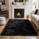 Soft black shag area rug