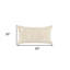 Coussin lombaire beige à motif botanique brodé