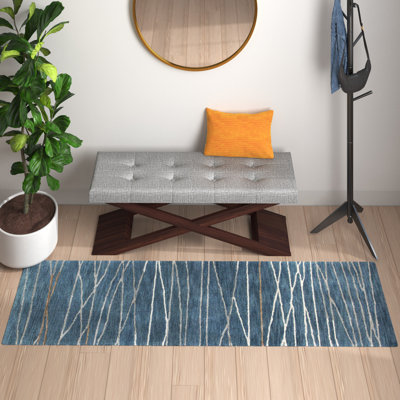 Tapis bleu azur à motif abstrait touffeté à la main Soleia