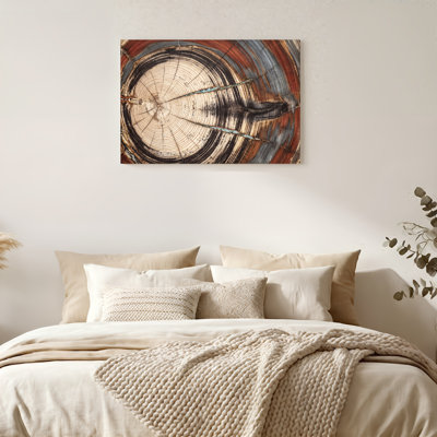 Art mural sur toile en forme de souche d'arbre avec anneaux rouges et crème