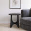 Table basse noire en bois-563889168