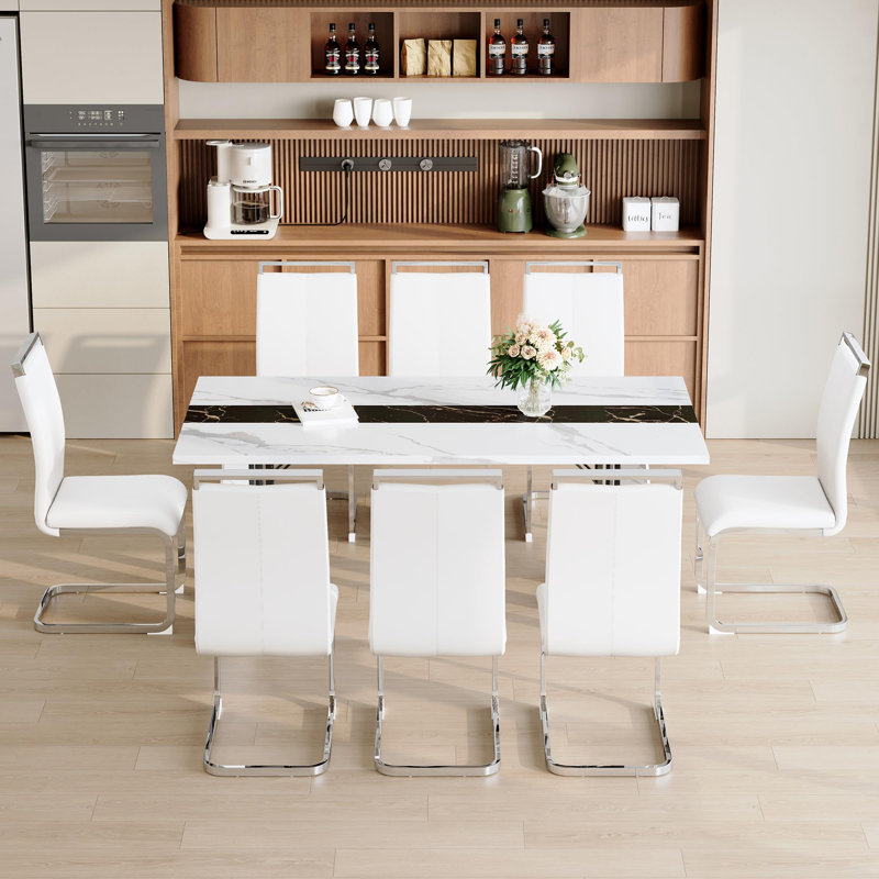 Ensemble de table de salle à manger 9 pièces comprenant un plateau en faux marbre et des pieds de soutien profilés. La table de salle à manger 70,9 "rectangulaire pour 70 personnes offre stabilité, confort et style.
