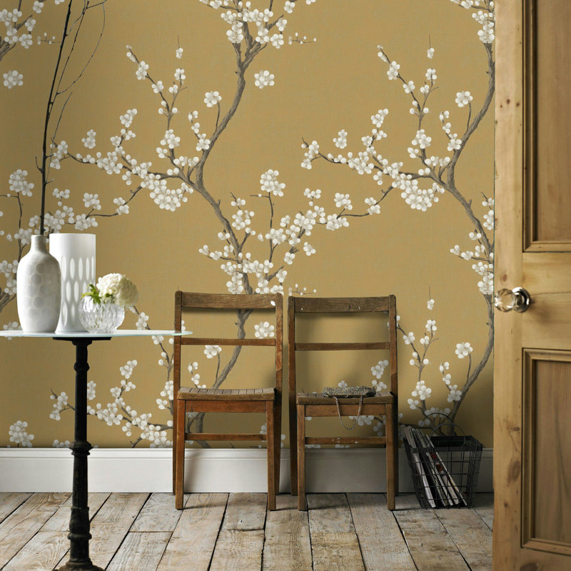 Branches de papier peint élégantes d'inspiration chinoiserie sur rouleau adhésif moutarde