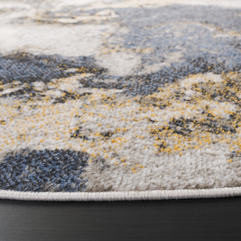 Pyramid Performance Abstract Rug, Round 6'7"