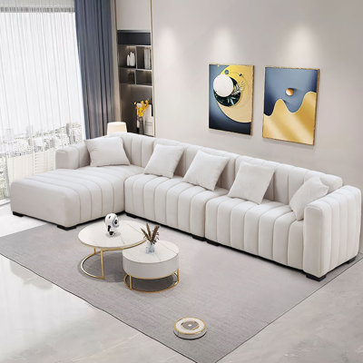 Canapé capitonné en velours capitonné avec méridienne gauche, offrant confort et style pour la décoration moderne