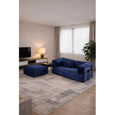 Canapé modulaire en velours bleu