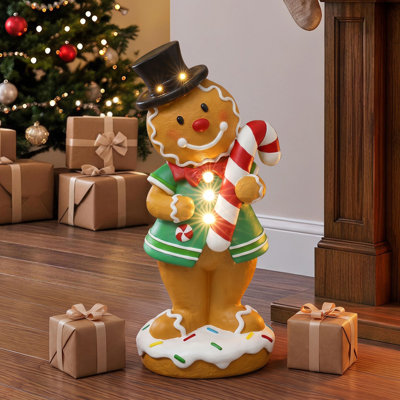 24.02" Pre-Lit Gingerbread Christmas Statue with LED Lights and Candy Cane, Indoor & Covered Outdoor Holiday Decor