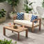 Table basse en bois avec coussins imperméables et lattes ouvertes, table d'extérieur beige brun, coussins résistants aux intempéries