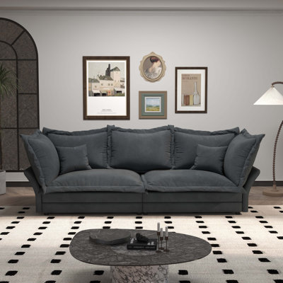 Canapé convertible confortable avec coussins moelleux et conception polyvalente pour divers espaces