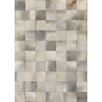 Teague Geometric Cowhide Area Rug