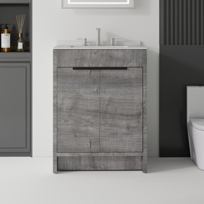 Meuble-lavabo autoportant de 61 cm (24 po) avec lavabo en céramique, portes à fermeture amortie, comptoir et dosseret en marbre reconstitué blanc granit de 1,5 cm (0,6 po), armoire en contreplaqué, gris