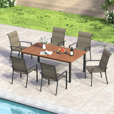Ensemble repas rectangulaire pour 6 personnes avec table de salle à manger en métal 63 po et 6 chaises empilables rembourrées en polyester enduit de PVC