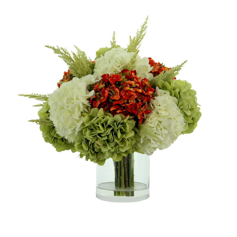 Assorted Hydrangea In A Round Vase