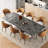 9-Piece Dining Set With 110.24'' Extendable Sintered Stone Table Top, 8 Upholstered Faux Leather Dining Chairs & Metal Base