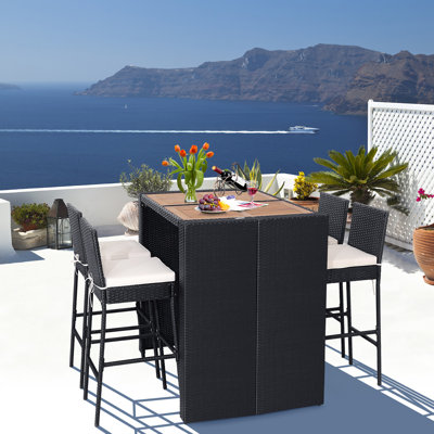 Arnisa 4-Person Wicker Rectangular Patio Dining Set