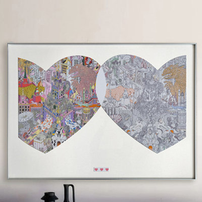 A black and white living room hanging painting with double heart colors