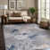 Chartier Machine Woven Floral Area Rug