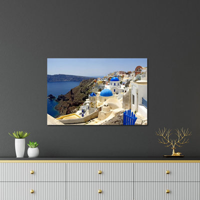 High angle view of a church Oia Santorini Cyclades Islands Greece Print On Acrylic Glass