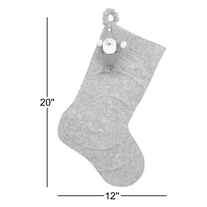 Gnome sur bas de Noël gris en laine feutrée à la main