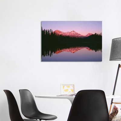 Or, Willamette Nf. Sunset Reddens The Three Sisters Which Reflect In Scott Lake. by John Barger - Wrapped Canvas Print