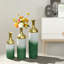 Vase de plancher décoratif en métal vert et blanc-133251296