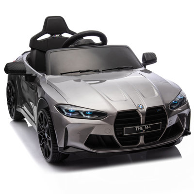 Bmw M4 24V pour enfants sur une voiture jouet 2,4 G avec télécommande pour les parents, réglable à trois vitesses, affichage de puissance, USB, MP3, Bluetooth, lumière DEL, histoire, une poignée avec des roues et une poignée, facile à transporter