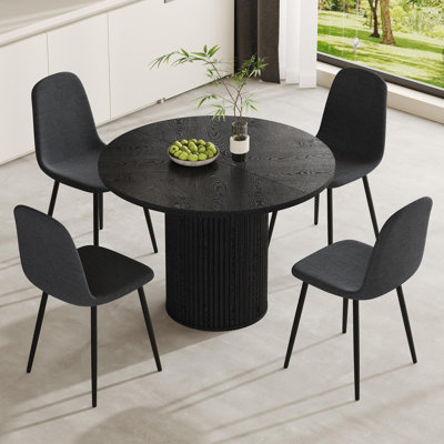 5-Piece Dining Table Set Featuring A Black Wooden Tabletop And Cylindrical Base. 42" Round Dining Table Set For 4, Combining Stability, Comfort, And Contemporary Style.