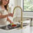 Stainless Steel 360-Degree Swivel Kitchen Faucet with Pull-Out Spray Head and Deck Plate