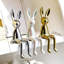 Trois sculptures décoratives de lapin