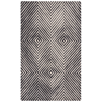 Tapis noir / ivoire en laine / coton touffeté à la main Joahan
